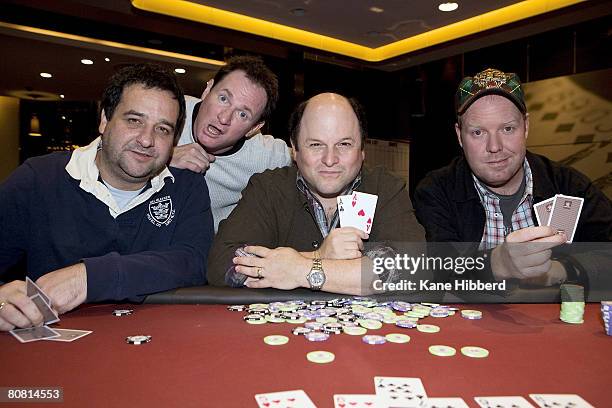 Comedians Mick Molloy, Russell Gilbert, Jason Alexander and Peter Helliar pose at a card table after a press conference to announce the start of...