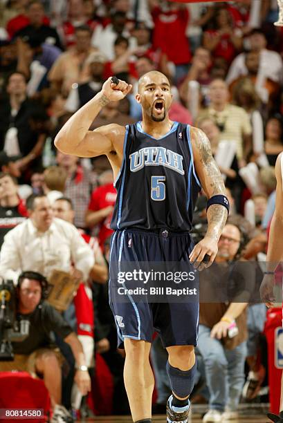 Carlos Boozer of the Utah Jazz cheers after winning in Game Two of the Western Conference Quarterfinals during the 2008 NBA Playoffs at the Toyota...