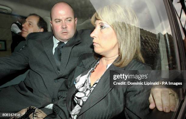 Spokesman Chris Johnson, Stuart Fergus and Denise Fergus, the mother of James Bulger leave the Old Bailey, in central London, following Jon...