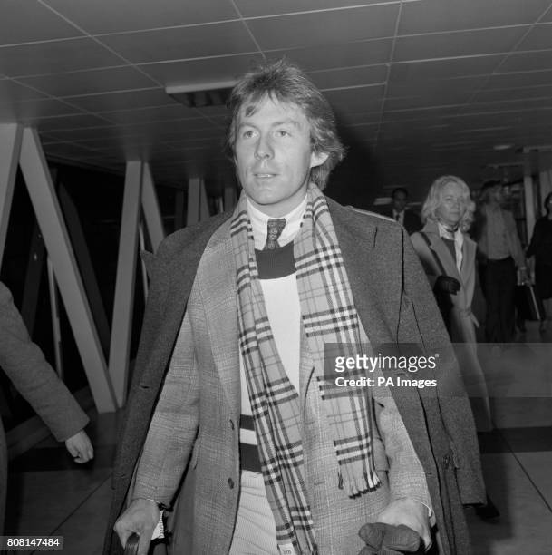 Singer Roddy Llewellyn, who recently launched his first record, leaving Heathrow Airport for New York.