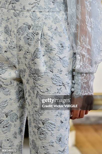 Model walks the runway during the Monique Lhuillier Ready to Wear Spring/Summer 2018 show as part of Haute Couture Paris Fashion Week on July 3, 2017...