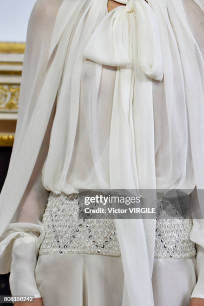 Model walks the runway during the Monique Lhuillier Ready to Wear Spring/Summer 2018 show as part of Haute Couture Paris Fashion Week on July 3, 2017...