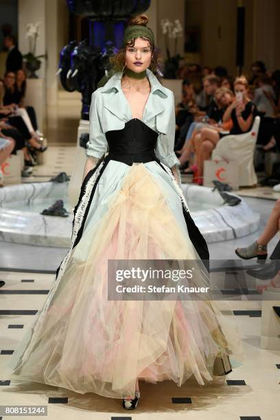 Model walks the runway at the Anja Gockel show during the Mercedes-Benz Fashion Week Berlin Spring/Summer 2018 at Hotel Adlon on July 4, 2017 in...