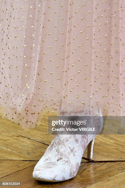 Model walks the runway during the Monique Lhuillier Ready to Wear Spring/Summer 2018 show as part of Haute Couture Paris Fashion Week on July 3, 2017...