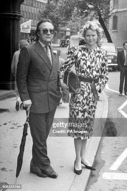 Still the best of friends, Dai Llewellyn and his former wife, Vanessa, outside the London Divorce Court, where she was granted a special procedure...