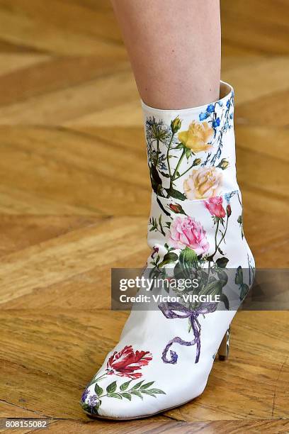 Model walks the runway during the Monique Lhuillier Ready to Wear Spring/Summer 2018 show as part of Haute Couture Paris Fashion Week on July 3, 2017...