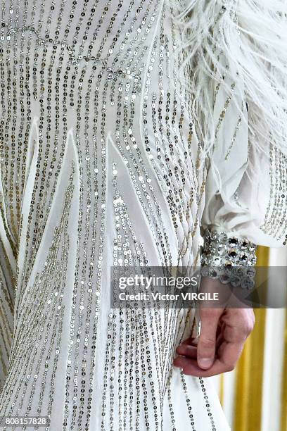 Model walks the runway during the Monique Lhuillier Ready to Wear Spring/Summer 2018 show as part of Haute Couture Paris Fashion Week on July 3, 2017...