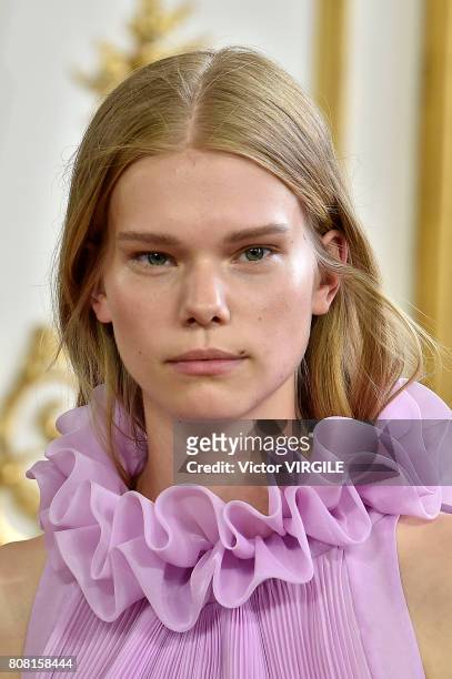 Model walks the runway during the Monique Lhuillier Ready to Wear Spring/Summer 2018 show as part of Haute Couture Paris Fashion Week on July 3, 2017...