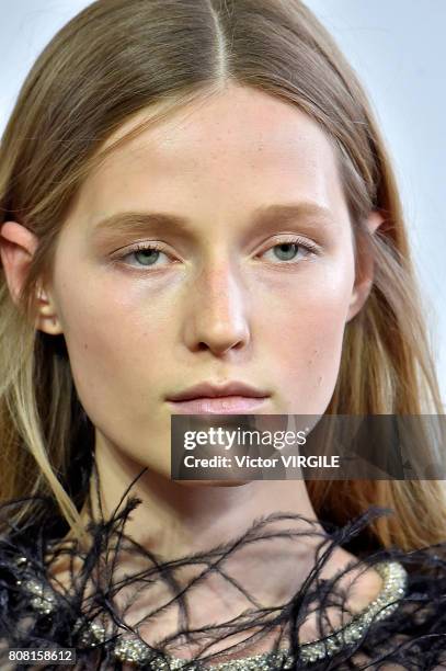 Model walks the runway during the Monique Lhuillier Ready to Wear Spring/Summer 2018 show as part of Haute Couture Paris Fashion Week on July 3, 2017...