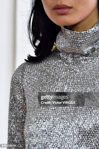 Model walks the runway during the Monique Lhuillier Ready to Wear Spring/Summer 2018 show as part of Haute Couture Paris Fashion Week on July 3, 2017...