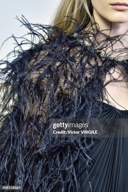 Model walks the runway during the Monique Lhuillier Ready to Wear Spring/Summer 2018 show as part of Haute Couture Paris Fashion Week on July 3, 2017...