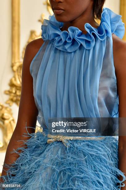 Model walks the runway during the Monique Lhuillier Ready to Wear Spring/Summer 2018 show as part of Haute Couture Paris Fashion Week on July 3, 2017...