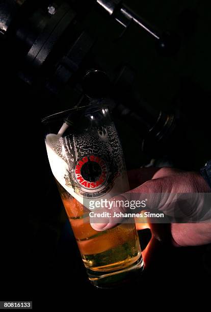 Worker samples a first beer after filtration at the Maisacher brewery , on April 22, 2008 in Maisach near Munich, Germany. Beer is regarded as the...