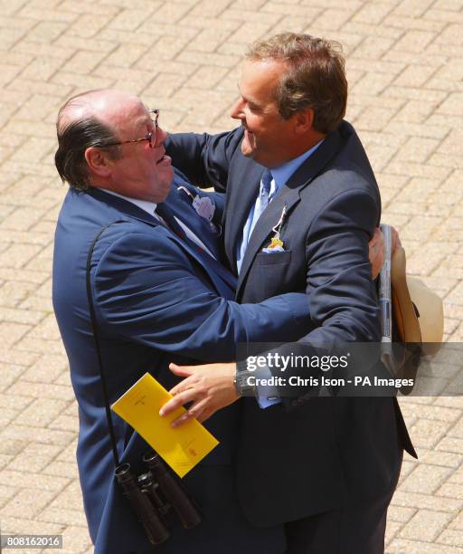 Sir Nicholas Soames with Harry Herbert of Highclere Racing during day two of Glorious Goodwood at Goodwood Racecourse, Chichester.