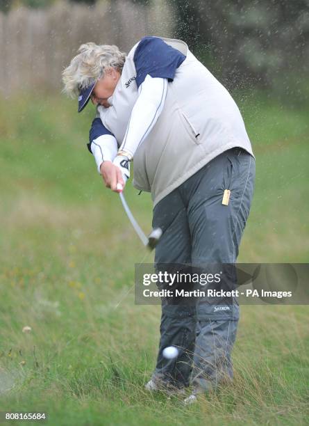 Laura Davies plays from the rough off the 1st fairway during the third round of the Ricoh Women's British Open at the Royal Birkdale Golf Club,...