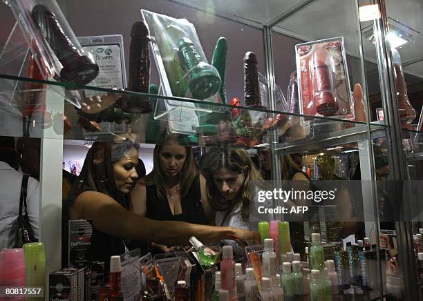 Women shop on April 19, 2008 at the 12th Erotika Fair, Latin America's biggest erotica trade show, held at the exhibition hall Mart Centre in Sao...