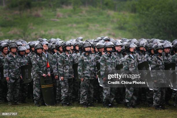 Militia soldiers mass during Nanjing's first anti-terror militia emergency drill at a training base on April 21, 2008 in Nanjing of Jiangsu Province,...