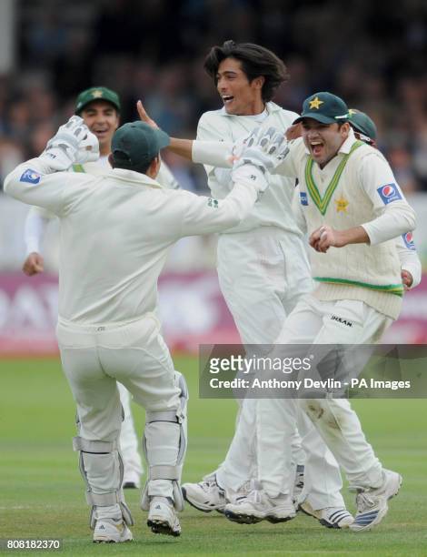 Pakistan's Mohammad Amir celebrates the wicket of the England's Graeme Swann during the Fourth npower Test match at Lord's Cricket Ground, London.