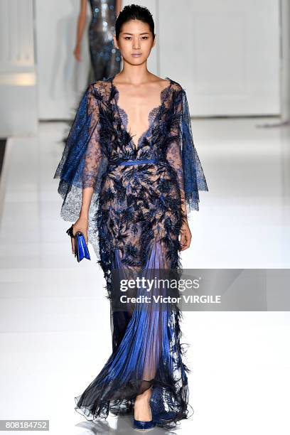 Model walks the runway during the Ralph & Russo Haute Couture Fall/Winter 2017-2018 show as part of Haute Couture Paris Fashion Week on July 3, 2017...