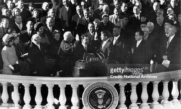 John F. Kennedy takes the Oath of Office for President of the United States in January of 1960 in Washington.