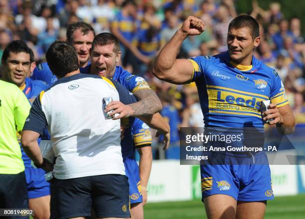 Leeds Rhinos' Ryan Hall and teammates celebrate their victory during the Carnegie Challenge Cup Semi Final match at the Galpharm Stadium,...