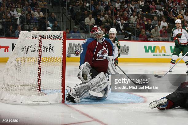 Goaltender Jose Theodore of the Colorado Avalanche makes a save against the Minnesota Wild during game six of the Western Conference Quarterfinals of...