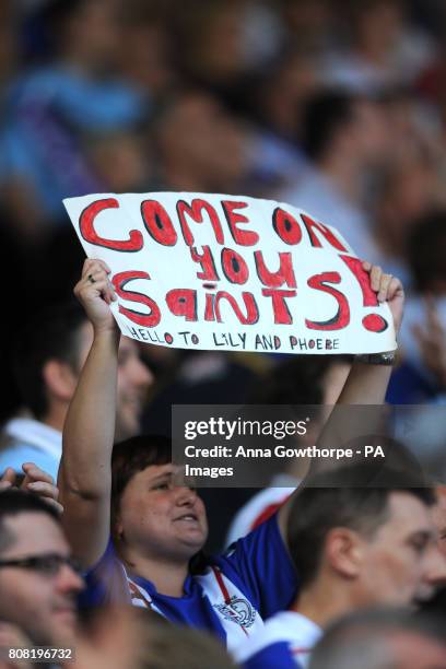 St Helens fan shows her support in the stands