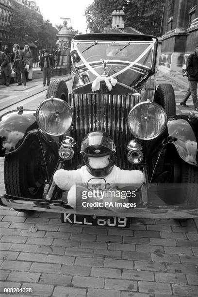 The bridal Rolls-Royce at the wedding of British Formula One driver James Hunt and model Suzy Miller, complete with miniature helmeted teddy, at...