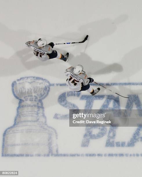 Rich Peverley and Josh Langfeld of the Nashville Predators skate around the ice for warmups before game five of the Western Conference Quarterfinals...