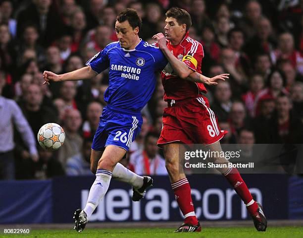 John Terry of Chelsea is challenged by Steven Gerrard of Liverpool during the UEFA Champions League Semi Final, first leg match between Liverpool and...