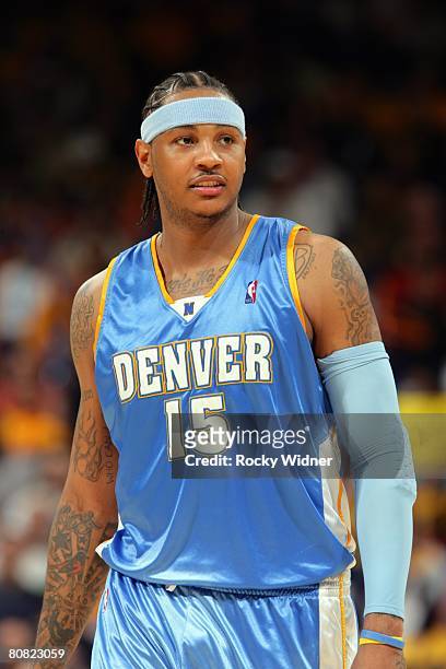 Carmelo Anthony of the Denver Nuggets looks on during the game against the Golden State Warriors at Oracle Arena on April 10, 2008 in Oakland,...