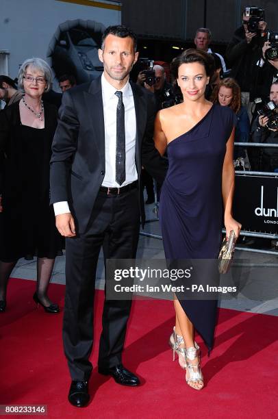 Ryan Giggs and wife Stacey at the 2010 GQ Men of the Year Awards at the Royal Opera House, Covent Garden, London.