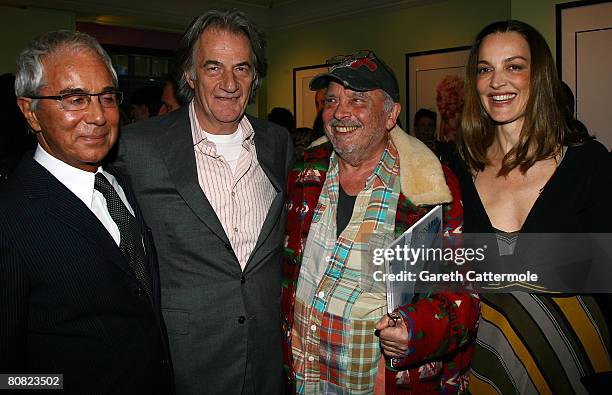 Photographer Gian Paolo Barbieri, designer Paul Smith, photographer David Bailey and his wife Catherine pose together at The Paul Smith store during...