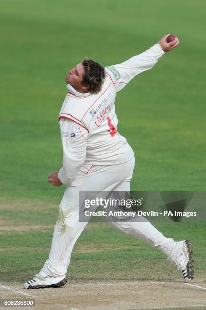 Glamorgan's Mark Cosgrove bowls during the division two county championship match between Surrey and Glamorgan at the Oval