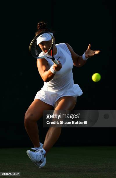 Bianca Andreescu of Canada plays a forehand during the Ladies Singles first round match Karen Khachanov of Russia on day two of the Wimbledon Lawn...