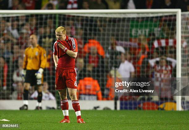 John Arne Riise of Liverpool shows his dejection after scoring an own goal during the UEFA Champions League Semi Final, first leg match between...