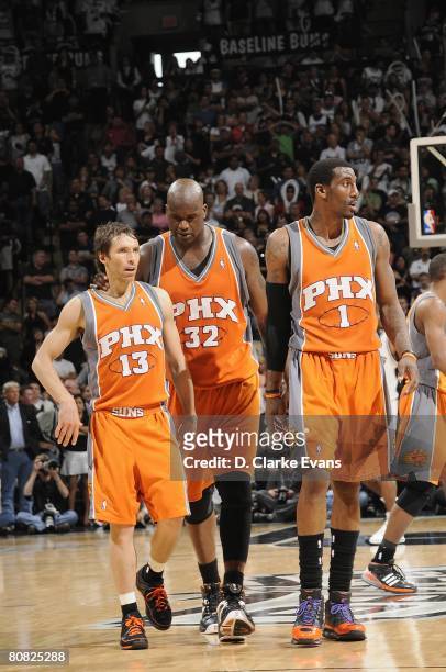 Steve Nash, Shaquille O'Neal and Amare Stoudemire of the Phoenix Suns walk down the court in Game One of the Western Conference Quarterfinals against...