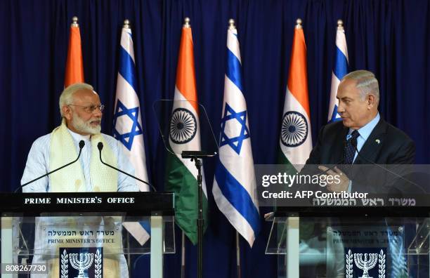 Indian Prime Minister Narendra Modi and Israeli Prime Minister Benjamin Netanyahu make a joint statement on July 4 at the Netanyahu's residence in...