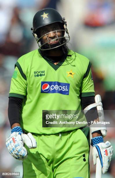 Pakistan's Mohammad Yousuf leaves the field after being given out lbw for 16 off the bowling of James Anderson during the Third One Day International...