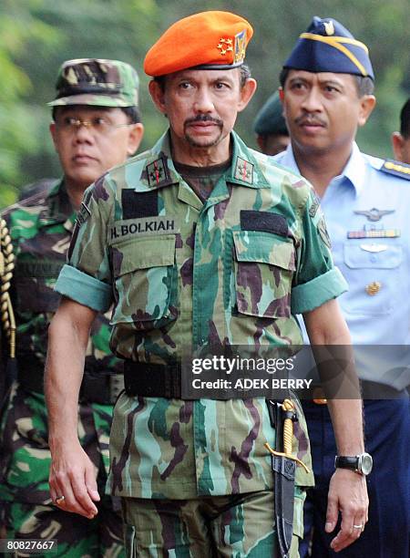 Sultan of Brunei Hassanal Bolkiah arrives in full Indonesian Air Force uniform to attend a ceremony in Jakarta on April 23, 2008. Bolkiah was given...