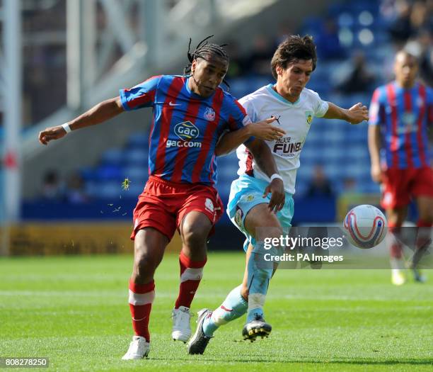 Crystal Palace's Neil Danns and Burnley's Jack Cork during the npower Football League Championship match at Selhurst Park, London.