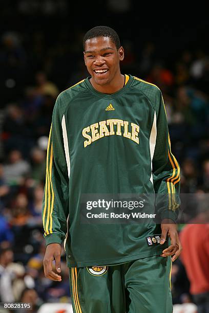 Kevin Durant of the Seattle SuperSonics smiles as he looks on during the NBA game against the Golden State Warriors on April 16, 2008 at Oracle Arena...