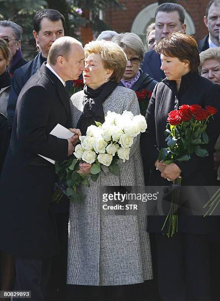 Russian President Vladimir Putin expresses his condolences to the widow of late Russian president Boris Yeltsin, Naina Yeltsin , as his daughter...
