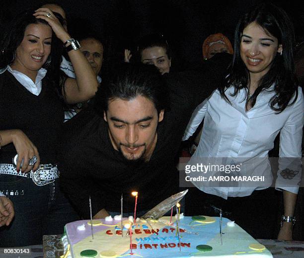 Egyptian actor Hani Salama flanked by his fiance Merihan and actress Sumaya Khashab celebrates his birthday with the stars and actors of producer...
