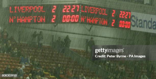 The score board shows the score after extra time during the third round Carling Cup match at Anfield, Liverpool.
