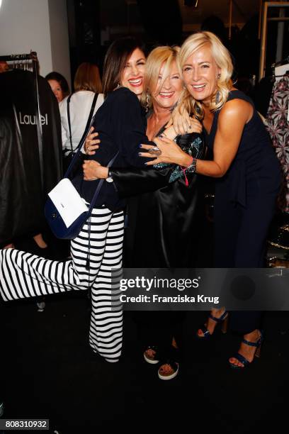 Viktoria Lauterbach, designer Elisabeth Schwaiger and Judith Milberg attend the Laurel show during the Mercedes-Benz Fashion Week Berlin...