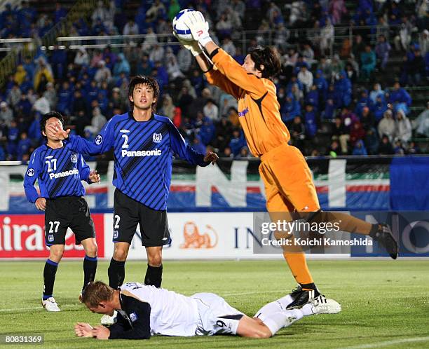 Naoki Matsuyo of Japan makes a save during the AFC Champions League Group G match between Gamba Osaka and Melbourne Victory at Expo '70 Stadium on...