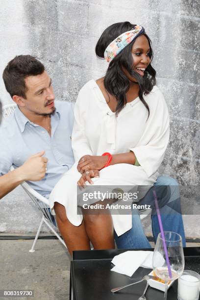 Evgenij Voznyuk and Motsi Mabuse attend the after show reception during the Riani Fashion Show Spring/Summer 2018 at Umspannwerk Kreuzberg on July 4,...