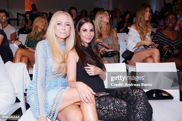 Jenny Elvers and Sila Sahin attend the Riani Fashion Show Spring/Summer 2018 at Umspannwerk Kreuzberg on July 4, 2017 in Berlin, Germany.