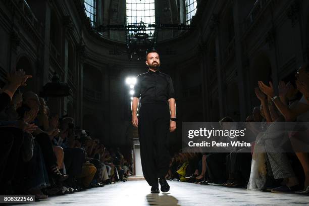 Julien Fournie acknowledges the audience after the Julien Fournie Haute Couture Fall/Winter 2017-2018 show as part of Haute Couture Paris Fashion...